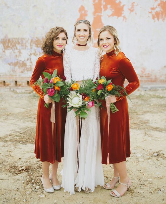 creative rust-colored midi bridesmaid dresses with long sleeves and turtlenecks and silver shoes for a boho fall wedding