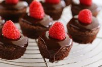 fudgy brownie bites with chocolate ganache and raspberries are a very refined option