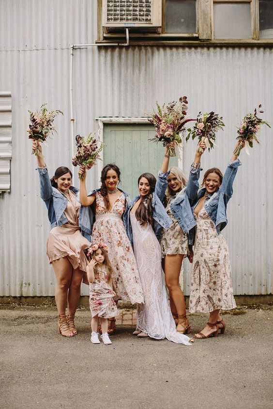 light blue denim jackets for the bride and her gals for a chilly summer wedding or a fall one