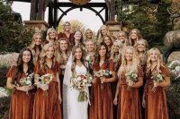lovely rust velvet midi wrap high low bridesmaid dresses with short sleeves and mismatching shoes for a backyard boho wedding