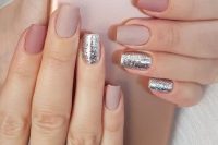 matte mauve, blush nails with touches of silver glitter for a refined, chic and girlish look