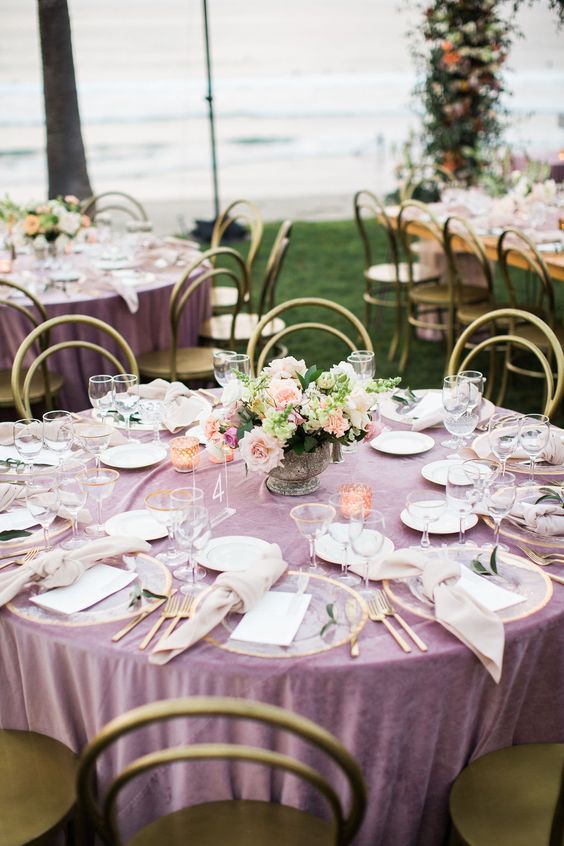 mauve velvet linens, pastel floral centerpieces and gilded touches made this tablescape amazing and very refined