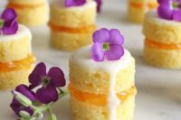 mini naked cakes filled with sweet and tangy orange marmalade and garnished with fresh flowers