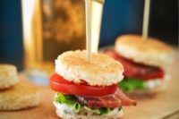 mini panini with tomatoes, bacon and herbs are a tasty and warming up idea fo a winter wedding appetizer
