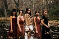 mismatching rust, burgundy and emerald maxi bridesmaid dresses of velvet and plain fabric are a great solution for a boho fall wedding