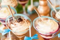 mousse cups with bite-size desserts and mini cake pops are a catchy and tasty idea