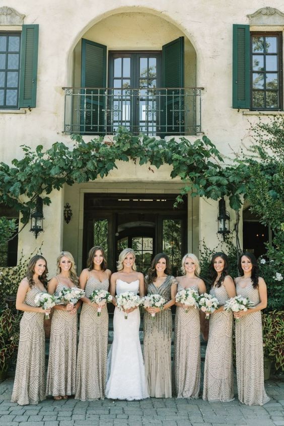 neutral full embellished bridesmaid dresses with spaghetti straps and a neutral dress with black embellishments and cap sleeves