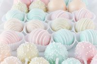 pastel cake pops and mini candies are amazing for a pastel wedding and look delicious