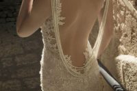 strands of pearls to accentuate the open back of the dress and make it stand out as much as possible