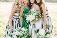 striped maxi gowns in black and white and an emerald one shoulder maxi dress for the maid of honor