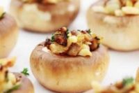 stuffed champignons with ham, cheese and greenery are amazing warming up finger food pieces