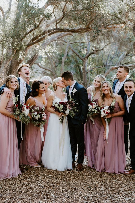 thick strap mauve maxi bridesmaid dresses with V-necklines and draped bodices for a summer wedding