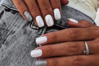 white mother of pearl and grey glitter nails look very shiny, glam and chic and make your look special