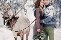 a Scandinavian winter groom’s look with a bold blue and white printed sweater and green pants is very cozy and comfy