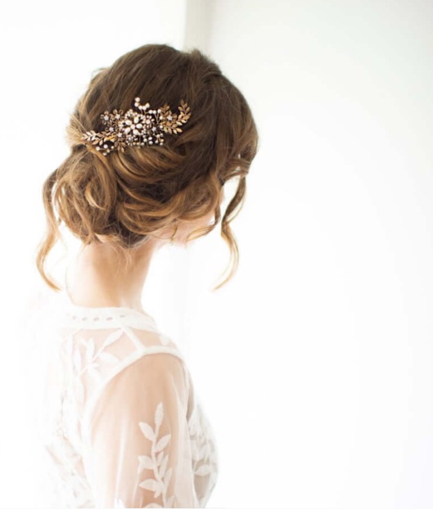 a beautiful vintage-inspired gold wedding hairpiece with rhinestones and pearls is a fantastic accessory to try