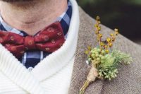 a blue plaid shirt, a white sweater, a tweed blazer and a red printed bow tie for a cozy and lovely winter groom’s look