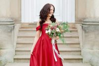 a fantastic red off the shoulder A-line wedding dress will stand out in pale winter locations