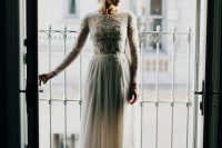 a gorgeous long sleeve dress with a beaded bodice and a flowing skirt is perfect for a chic wedding