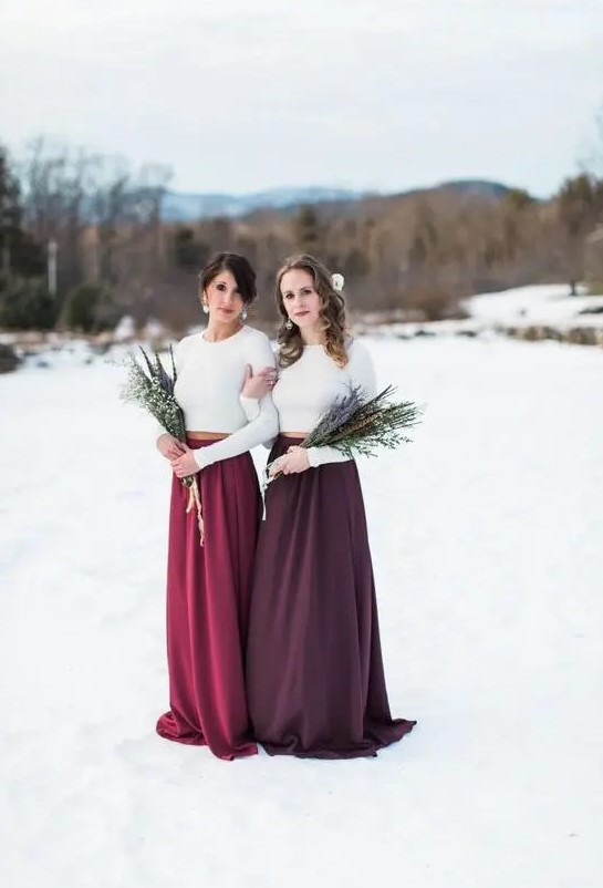 bold looks with white crop tops and long sleeves and high necklines plus jewel tone maxi skirts with trains for a winter wedding