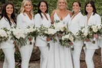 classic white pantsuits with white tops underneath, nude shoes are a perfect solution for a modern bridal party in white