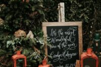 cute holiday touches – plaid, red lanterns, fir and evergreens for a Chrismas wedding