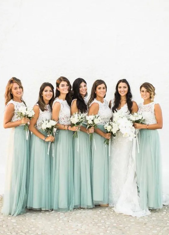 elegant sleeveless white lace tops and seafoam green maxi skirts for an ocean or beach wedding