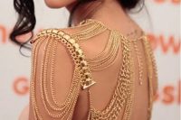 gold chain shoulder jewelry with a statement element is a chic and modern glam idea to try