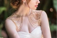gorgeous gold and beads and pearls shoulder jewelry that echoes with the bridal hair and adds a warm feel