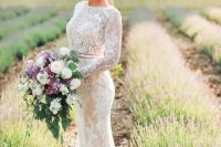 long sleeve sheath lace applique wedding dress with a high neckline and a sash to highlight the waist