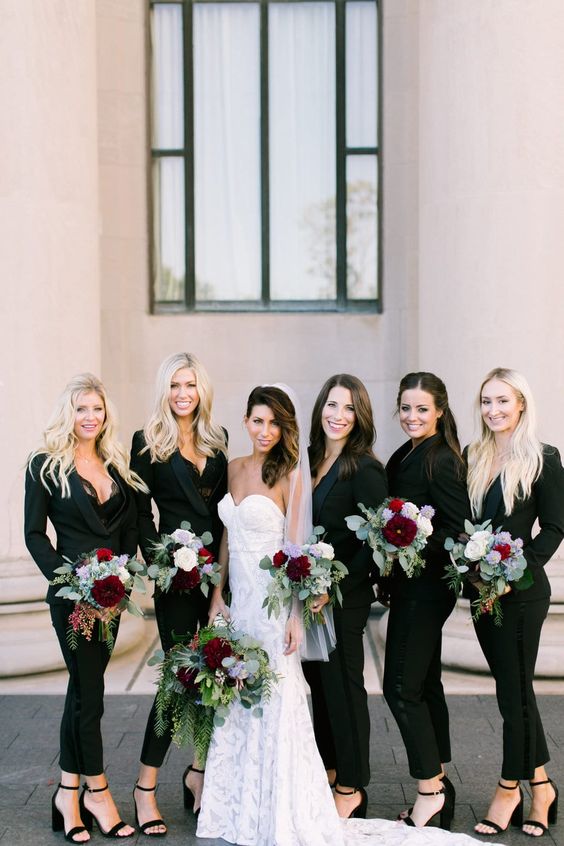 matching black pantsuits with lace tops and black shoes are great for modern weddings and not only, they look sexy