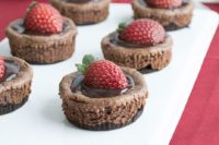mini chocolate strawberry cheesecakes with chocolate and fresh berries on top are delicious
