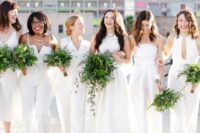 mismatching bridesmaids’ jumpsuits in white and dresses for a bit of edge on your big day