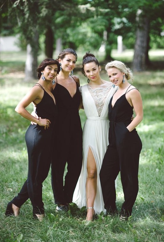 sexy black bridesmaid jumpsuits with spaghetti straps and deep V-necklines plus black shoes