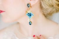 statement gold and blue earrings for a daring bride for something blue