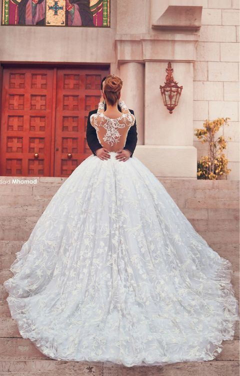 a gorgeous lace princess style wedding dress with long sleeves, an illusion back and a skirt with a train is a lovely idea