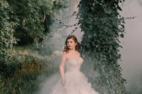 a gorgeous strapless sweetheart neckline wedding ballgown with a full ruffled skirt will instantly give your look a princess feel