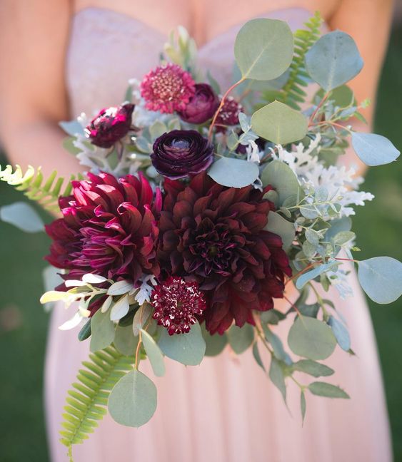 a lovely wedding bouquet with marsala blooms and greenery is a gorgeous idea both for a bride and a bridesmaid