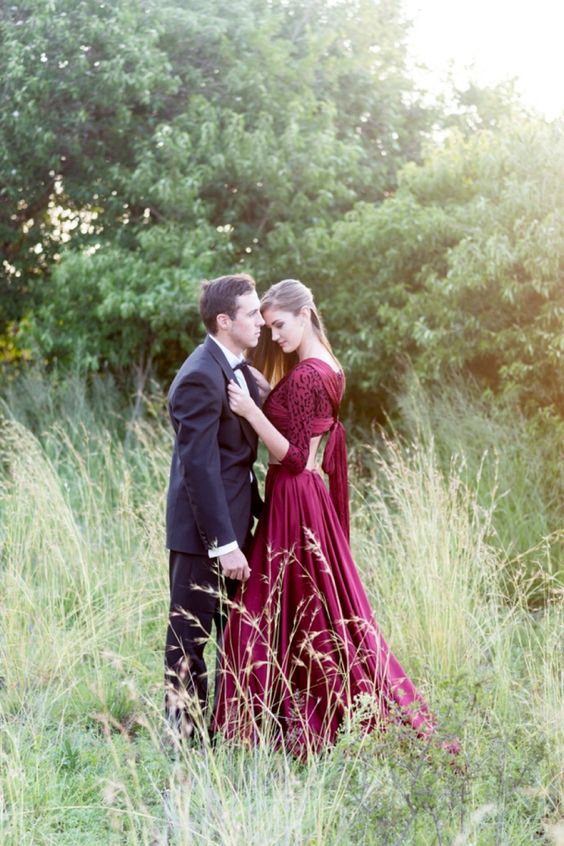 a marsala wedding separate with a crop top with ties on the back and a pleated maxi skirt with a train will make a statement