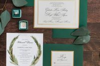 an elegant emerald and gold wedding stationery suite, with gold edges and gold seals, with painted leaves for a beautiful fall wedding