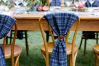 blue tartan covers for the chairs are great for a bold and cool look, they will match a garden wedding, for example