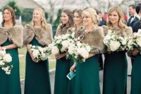 emerald maxi bridesmaid dresses with a fau fur coverup is a gorgeous idea for fall or winter