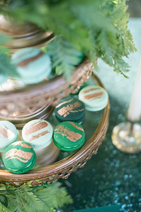 light green, emerald and dark green macarons with gold glitter touches are amazing for a wedding