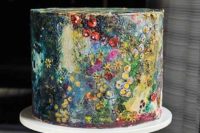 this watercolor-inspired wedding cake looks like a real work of art and will make a bold statement at the wedding
