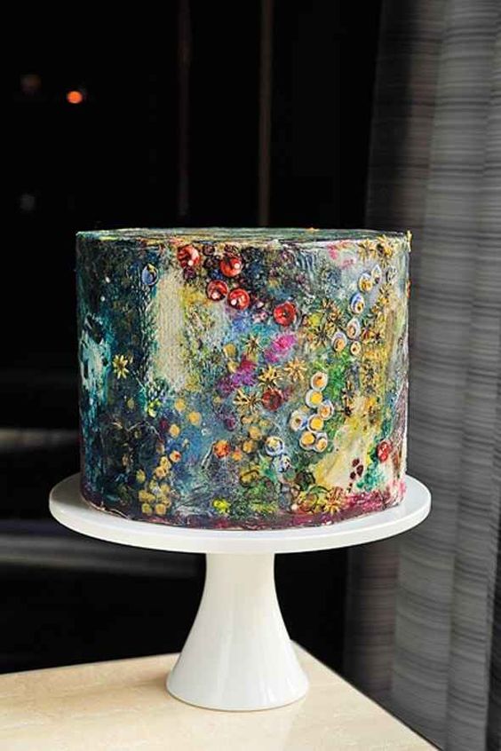 this watercolor-inspired wedding cake looks like a real work of art and will make a bold statement at the wedding