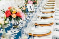Ikat table runners and cheery floral arrangements made this bright setup especially inviting