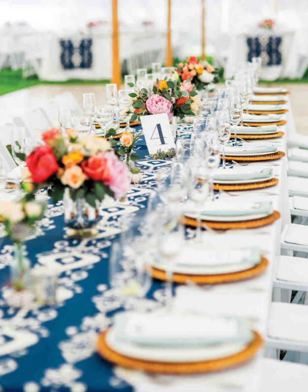 Ikat table runners and cheery floral arrangements made this bright setup especially inviting