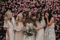 a lush pink flower wall is a dreamy wedding backdrop for the cermeony, photos and even your reception
