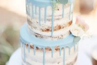 a naked spring wedding cake with mint drip and blush blooms on top is a gorgeous idea with plenty of pastels