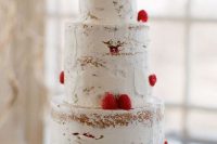 a naked wedding cake decorated with strawberries looks lovely, tasty and very cool, ideal for a Valentine wedding