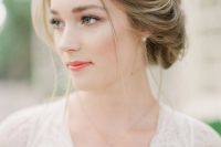 a pretty neutral wedding makeup with a bold pink lip, a touch of pink eyeshadow, a touch of blush and mascara